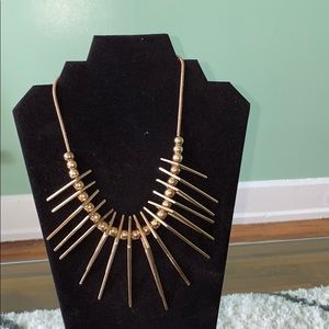 Gold also statement necklace